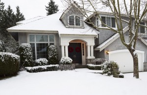 home exterior covered in snow